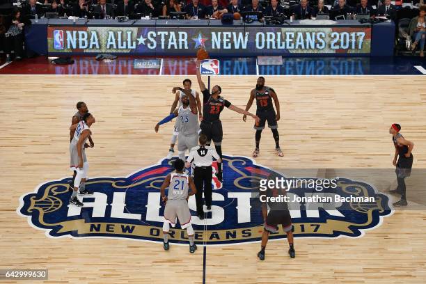 LeBron James of the Cleveland Cavaliers and Anthony Davis of the New Orleans Pelicans battle for the opening tip-off at the start of the 2017 NBA...