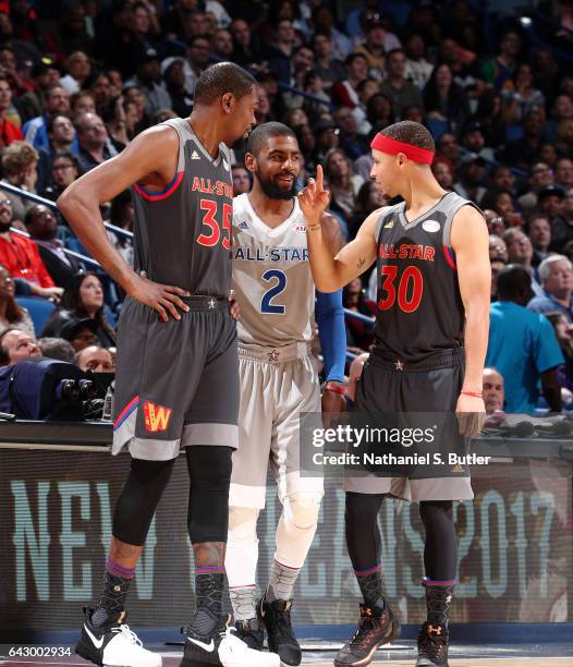 Kevin Durant of the Western Conference All-Stars, Stephen Curry of the Western Conference All-Stars and Kyrie Irving of the Eastern Conference...