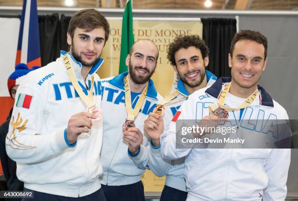 Team Italy's Enrico Garozzo, Andrea Santarelli, Marco Fichera, Paolo Pizzo show their bronze medals won during team competition at the Peter Bakonyi...