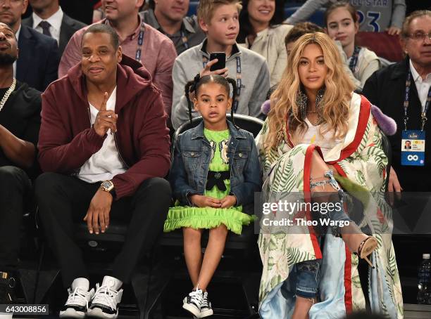 Jay Z, Blue Ivy Carter and Beyoncé Knowles attend the 66th NBA All-Star Game at Smoothie King Center on February 19, 2017 in New Orleans, Louisiana.