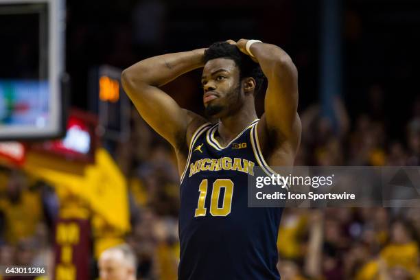 Michigan Wolverines guard Derrick Walton Jr. Reacts after missing a game tying 3 pointer during the Big Ten Conference game between the Michigan...