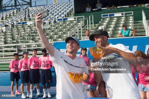 Jesse Levine and James Blake during the trophy ceremony for the ATP Champions Tour Delray Beach Open on February 19 at Delray Beach Stadium & Tennis...