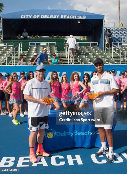 Jesse Levine and James Blake during the trophy ceremony for the ATP Champions Tour Delray Beach Open on February 19 at Delray Beach Stadium & Tennis...