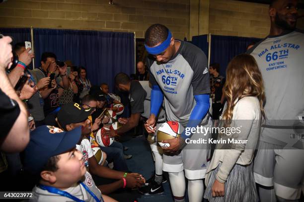 Carmelo Anthony signs autographs backstage during the 66th NBA All-Star Game at Smoothie King Center on February 19, 2017 in New Orleans, Louisiana.
