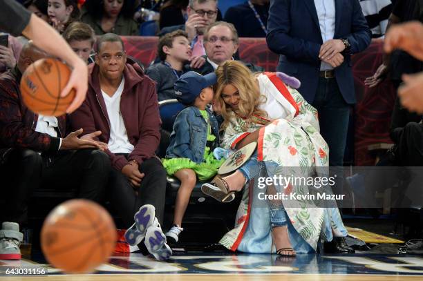 Jay Z, Blue Ivy Carter, Beyoncé Knowles attend the 66th NBA All-Star Game at Smoothie King Center on February 19, 2017 in New Orleans, Louisiana.