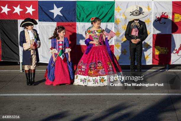 The four Abrazo children William Palumbo, III, Ella Gonzalez, Cassandra Zamudio and Mateo Morales stand during the International Bridge Ceremony in...