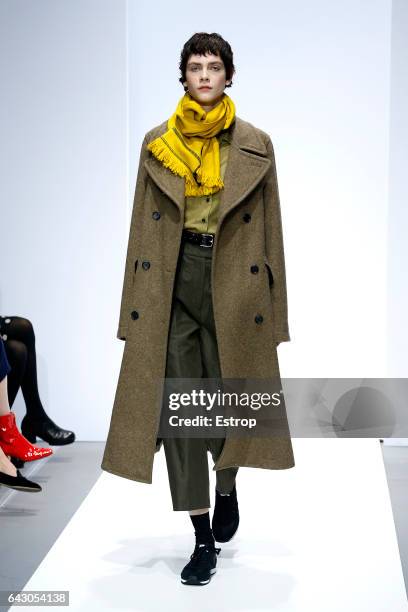 Model walks the runway at the Margaret Howell show during the London Fashion Week February 2017 collections on February 19, 2017 in London, England.