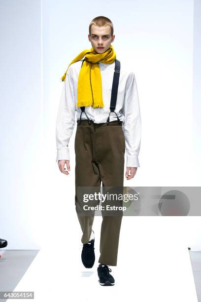 Model walks the runway at the Margaret Howell show during the London Fashion Week February 2017 collections on February 19, 2017 in London, England.