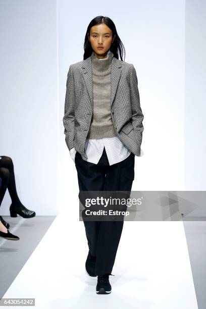 Model walks the runway at the Margaret Howell show during the London Fashion Week February 2017 collections on February 19, 2017 in London, England.