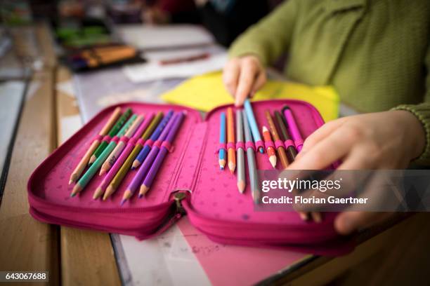 Student takes a pen from his pencil case. Feature at a school in Goerlitz on February 03, 2017 in Goerlitz, Germany.