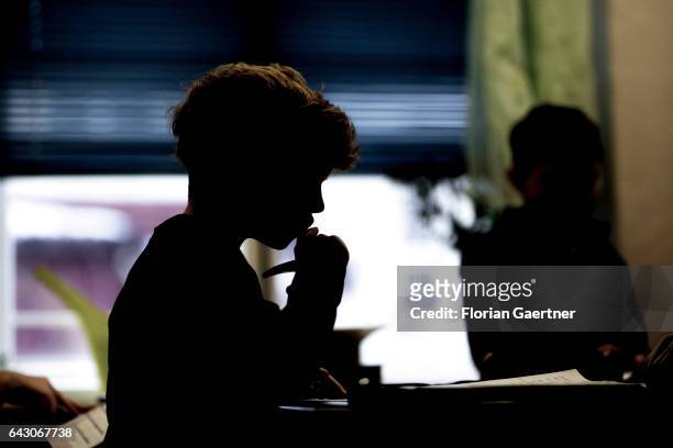 Boy is learning during class. Feature at a school in Goerlitz on February 03, 2017 in Goerlitz, Germany.