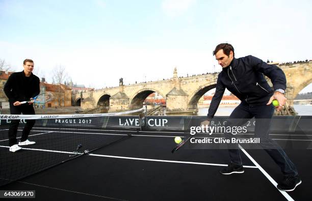 Roger Federer of Switzerland in action against Tomas Berdych of The Czech Republic in front of the Charles Bridge during the countdown to the...