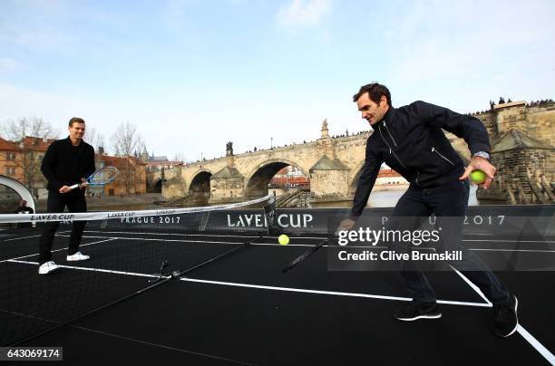 Roger Federer of Switzerland in action against Tomas Berdych of The Czech Republic in front of the Charles Bridge during the countdown to the...