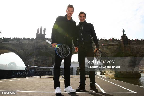 Roger Federer of Switzerland and Tomas Berdych of The Czech Republic pose for photos in front of the Charles Bridge during the countdown to the...