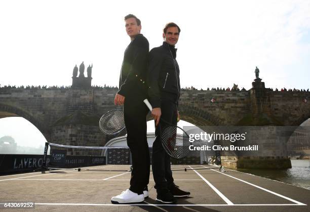 Roger Federer of Switzerland and Tomas Berdych of The Czech Republic pose for photos in front of the Charles Bridge during the countdown to the...