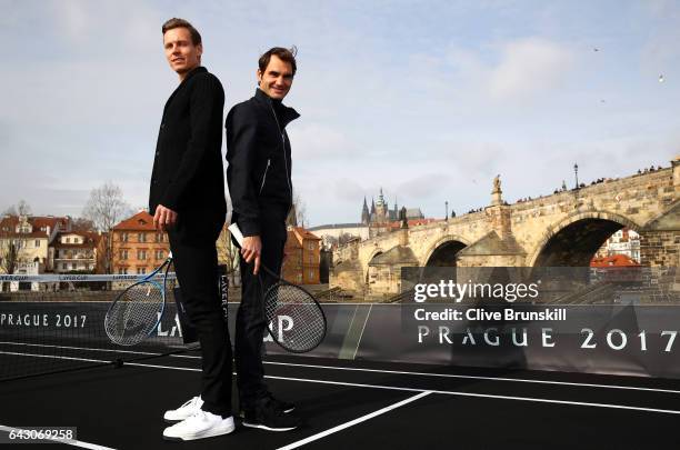 Roger Federer of Switzerland and Tomas Berdych of The Czech Republic pose for photos in front of the Charles Bridge during the countdown to the...