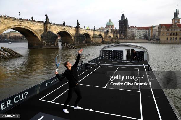 Roger Federer of Switzerland in action against Tomas Berdych of The Czech Republic in front of the Charles Bridge during the countdown to the...