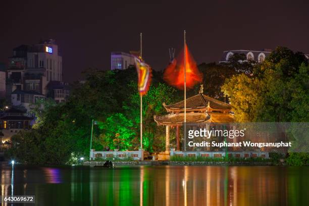 turtle tower at night on hoan kiem lake. vietnam. - spotted turtle stock pictures, royalty-free photos & images