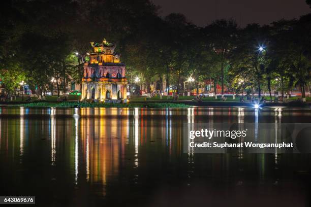 turtle tower at night on hoan kiem lake. vietnam. - spotted turtle stock pictures, royalty-free photos & images