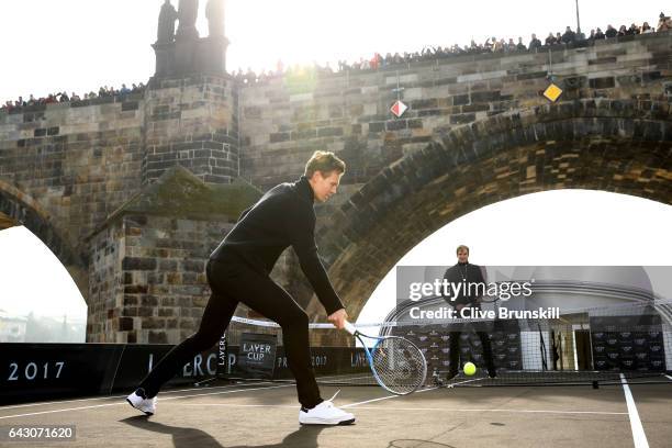 Roger Federer of Switzerland in action against Tomas Berdych of The Czech Republic in front of the Charles Bridge during the countdown to the...