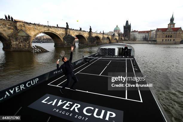 Roger Federer of Switzerland in action against Tomas Berdych of The Czech Republic in front of the Charles Bridge during the countdown to the...