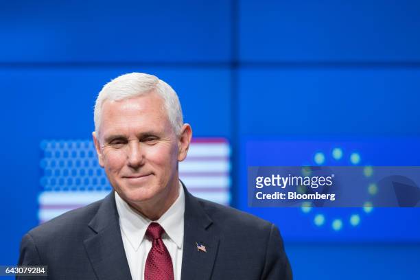 Vice President Mike Pence reacts during a news conference at the Europa building in Brussels, Belgium, on Monday, Feb. 20, 2017. Pence flew out of...