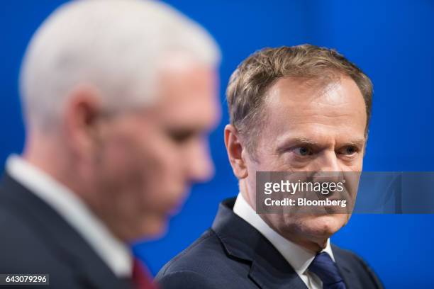 Donald Tusk, president of the European Union , right, looks on as he stands beside U.S. Vice President Mike Pence, during a news conference at the...