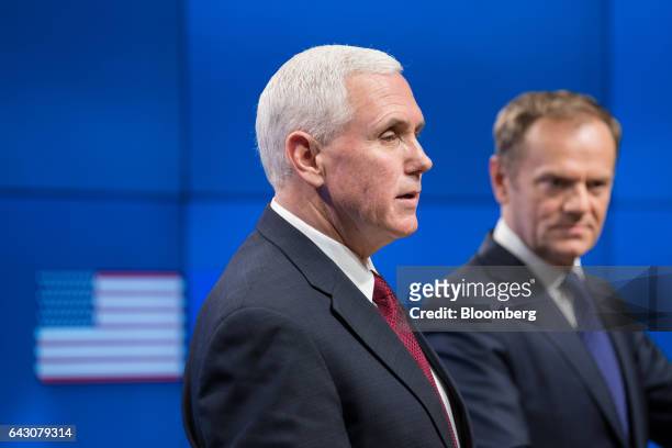 Vice President Mike Pence, left, speaks as Donald Tusk, president of the European Union , looks on during a news conference at the Europa building in...