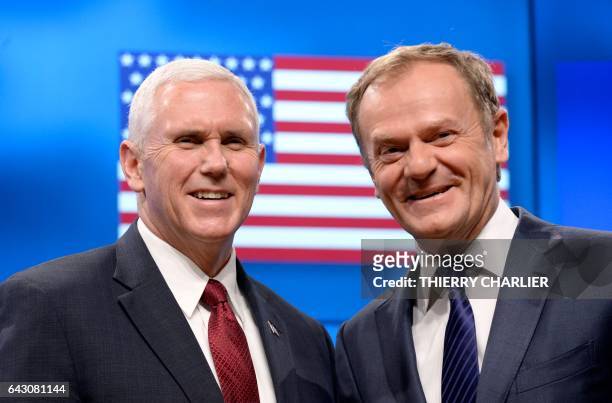 Vice-President Mike Pence and European Council head Donald Tusk pose after their meeting at the European Commission in Brussels on February 20, 2017....