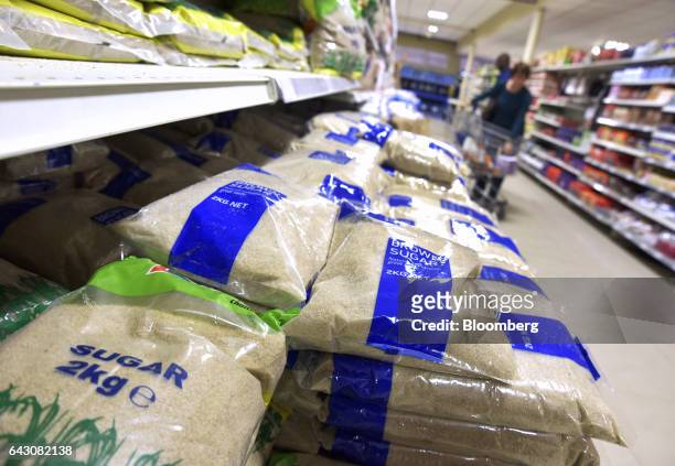 Two kilo bags of brown sugar sit on display inside a Nakumatt Holdings Ltd. Supermarket in Nairobi, Kenya, on Saturday, Feb. 18, 2017. Nakumatt is...
