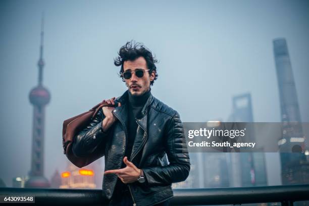 traveling hipster - biker jacket stock pictures, royalty-free photos & images