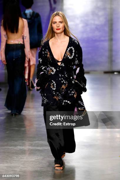 Model walks the runway at the Topshop Unique designed by Kate Phelan show during the London Fashion Week February 2017 collections on February 19,...