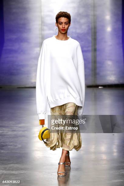 Model walks the runway at the Topshop Unique designed by Kate Phelan show during the London Fashion Week February 2017 collections on February 19,...