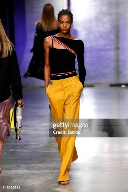 Model walks the runway at the Topshop Unique designed by Kate Phelan show during the London Fashion Week February 2017 collections on February 19,...