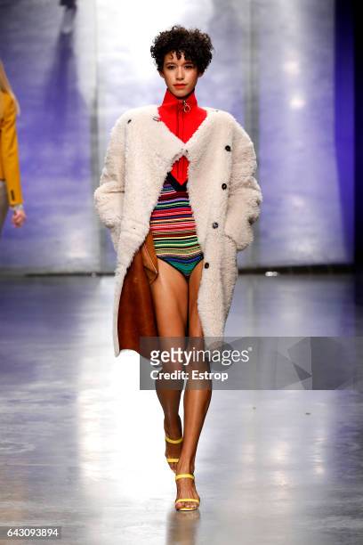 Model Dilone walks the runway at the Topshop Unique designed by Kate Phelan show during the London Fashion Week February 2017 collections on February...