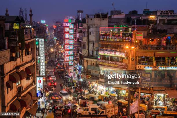 city life- main bazar by night, paharganj, new delhi, india - new delhi stock pictures, royalty-free photos & images