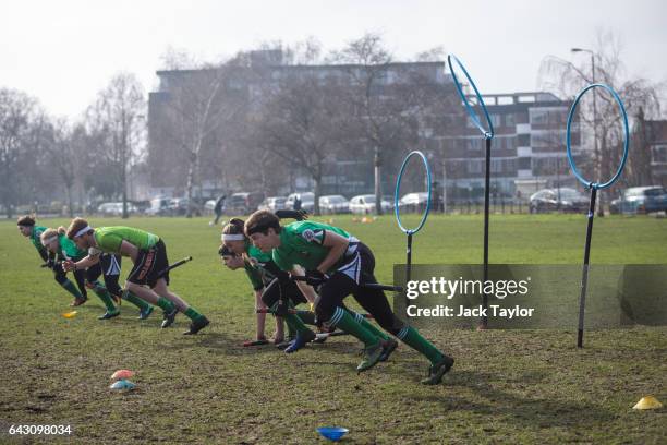 The Keele Squirrels quidditch team run during the Crumpet Cup quidditch tournament on Clapham Common on February 18, 2017 in London, England....