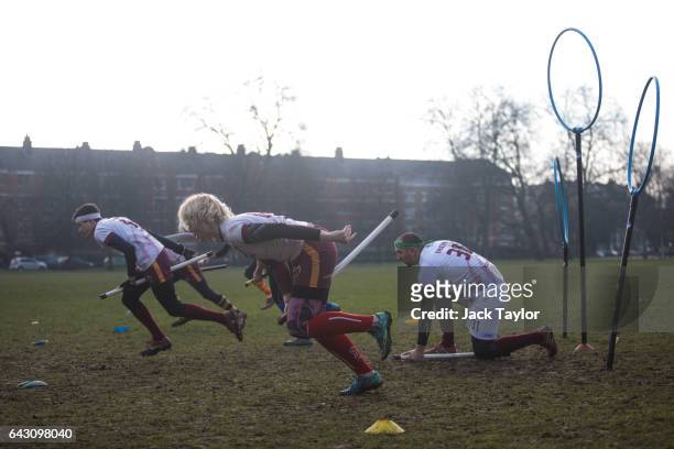 The Werewolves of London quidditch team run during the Crumpet Cup quidditch tournament on Clapham Common on February 18, 2017 in London, England....