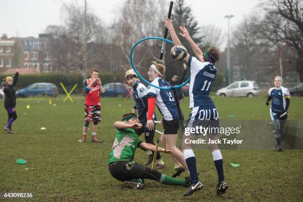 Player collides with a hoop as the Keele Squirrels play the Radcliffe Chimeras during the Crumpet Cup quidditch tournament on Clapham Common on...