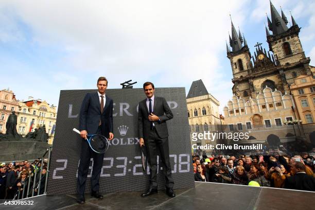 Roger Federer of Switzerland and Tomas Berdych of The Czech Republic pose in the Old Town Square during the countdown to the inaugural Laver Cup on...