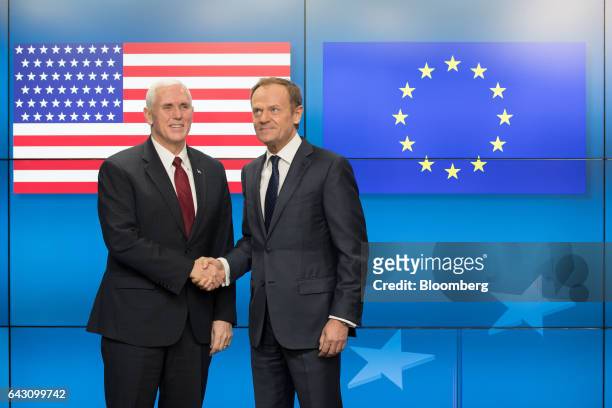Vice President Mike Pence, left, and Donald Tusk, president of the European Union , pose for photograph ahead of a meeting at the Europa building in...