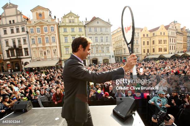 Roger Federer of Switzerland waves to the crowd in the Old Town Square during the countdown to the inaugural Laver Cup on February 20, 2017 in...