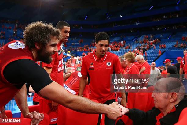 Matt Knight of the Wildcats acknoweldges Wildcats owner Jack Bendat after winning the game two NBL Semi Final match between the Perth Wildcats and...
