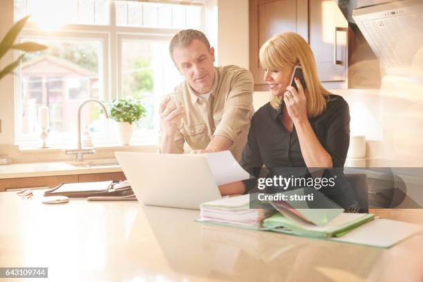 online banking - couple choosing stock pictures, royalty-free photos & images