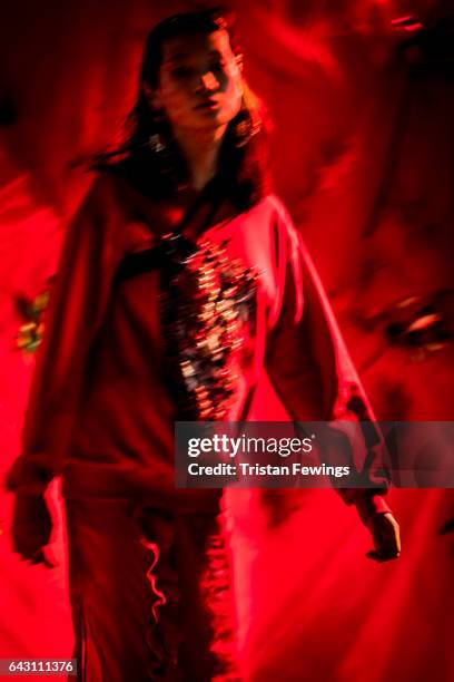 Model backstage ahead of the Haluminous presentation during the London Fashion Week February 2017 collections on February 19, 2017 in London, England.