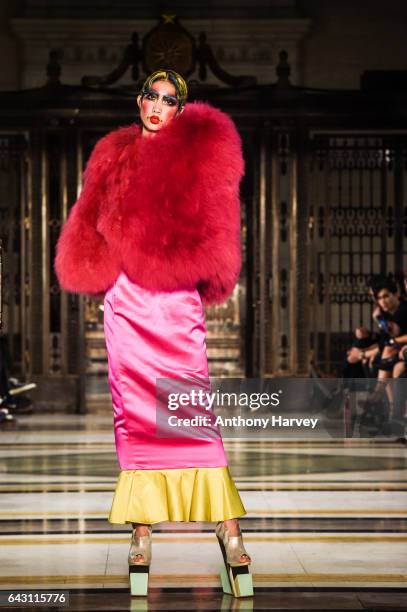 Model walks the runway at the David Ferreira show during the London Fashion Week February 2017 collections on February 20, 2017 in London, England.
