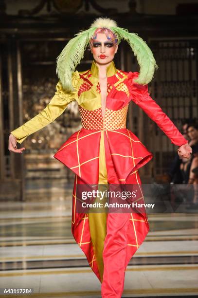 Model walks the runway at the David Ferreira show during the London Fashion Week February 2017 collections on February 20, 2017 in London, England.