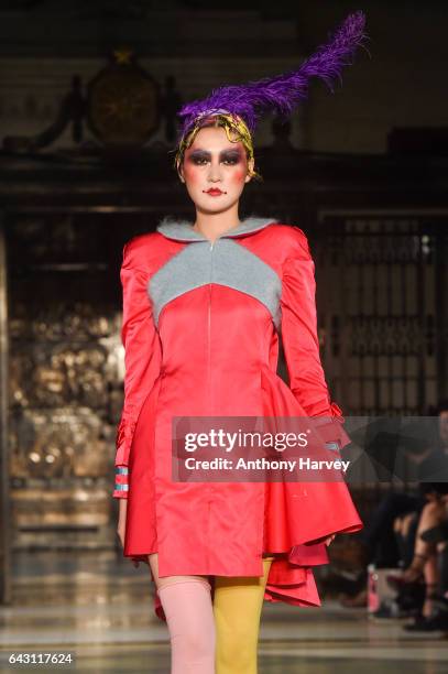 Model walks the runway at the David Ferreira show during the London Fashion Week February 2017 collections on February 20, 2017 in London, England.