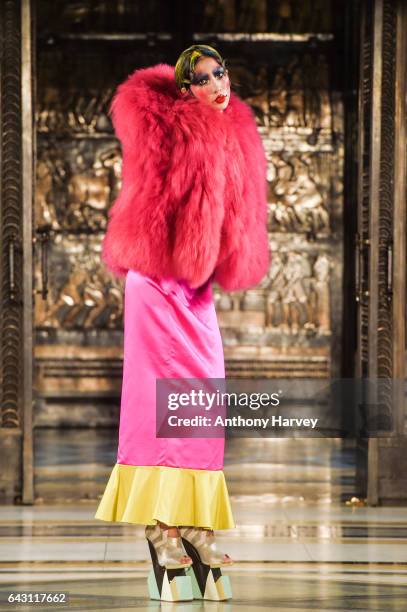 Model walks the runway at the David Ferreira show during the London Fashion Week February 2017 collections on February 20, 2017 in London, England.