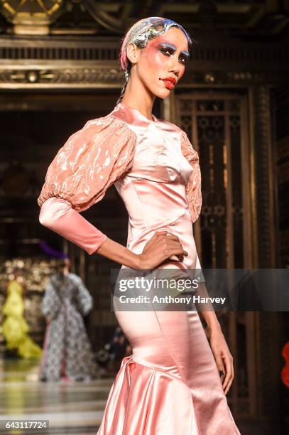 Model walks the runway at the David Ferreira show during the London Fashion Week February 2017 collections on February 20, 2017 in London, England.